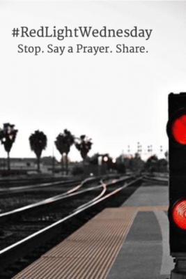 Train tracks and red light