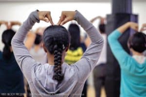 Dancers view from behind heart