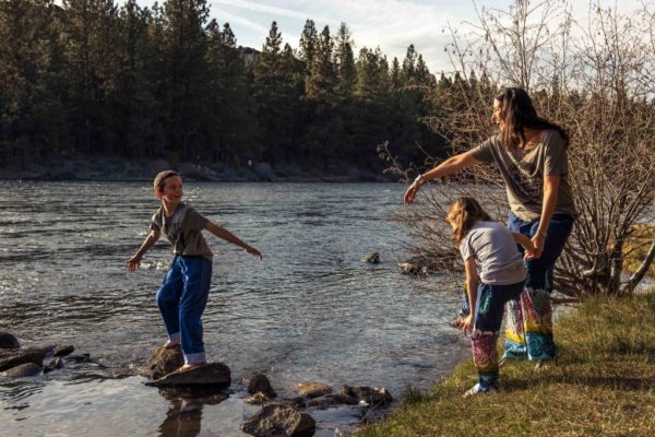 Shannon and her kids at the river