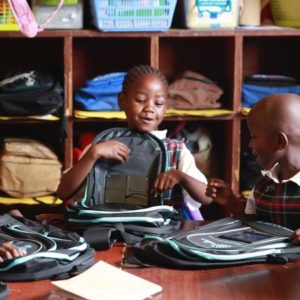 Child in school with backpack