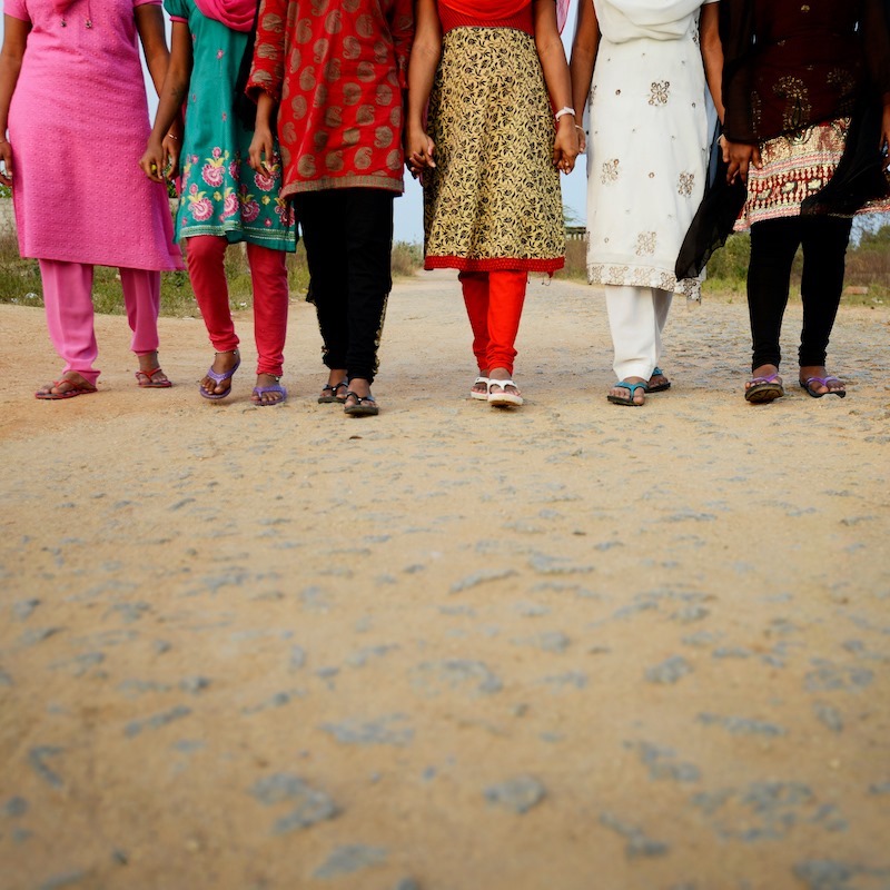 women holding hands